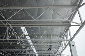 Insulated Ceiling Framework in Construction Site