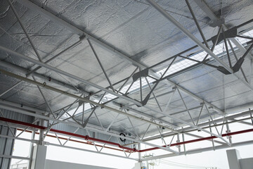 Insulated Ceiling Framework in Construction Site