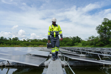 Solar energy engineers work on consulting and inspecting the performance of solar panels outside power plants and wind turbines.	
