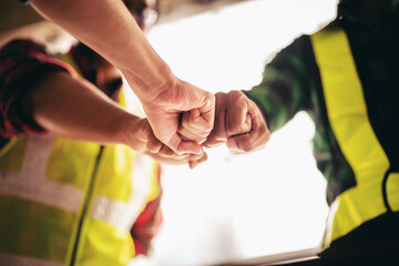A group of people are giving each other high fives