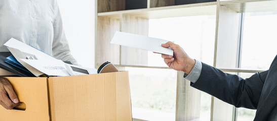 Hand of employer filing final remuneration after employee to write a document letter of...
