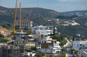 Building new modern houses on a hillside in Limassol, Cyprus