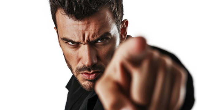 Portrait of a man pointing at the camera with an annoyed or angry facial expression isolated on a transparent background