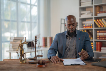 Lawyer carefully reviewing legal documents, ensuring accuracy and compliance, with justice scales...