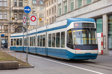 Fototapeta na wymiar Blue tram in Zurich city center. Modern new vehicle, public transportation. Switzerland,