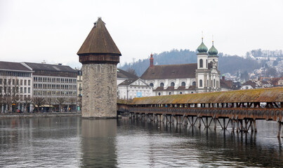 Switzerland, Chapel Bridge and Water Tower. Lucerne. Oldest covered bridge in Europe