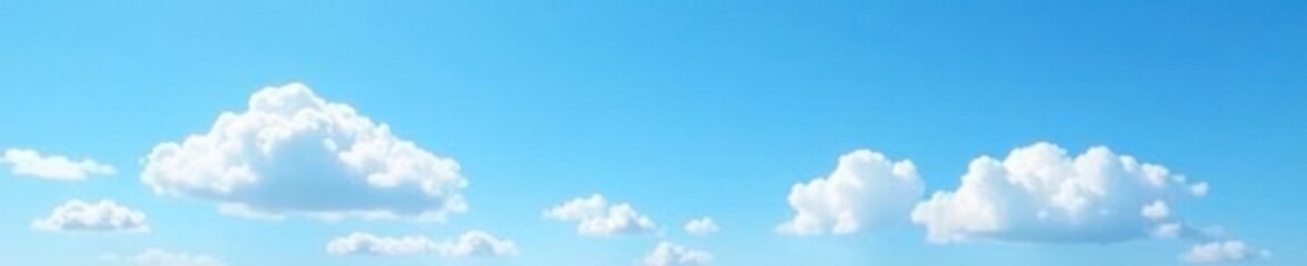 Obraz premium Soft white clouds float across a bright blue sky, scenery, serene