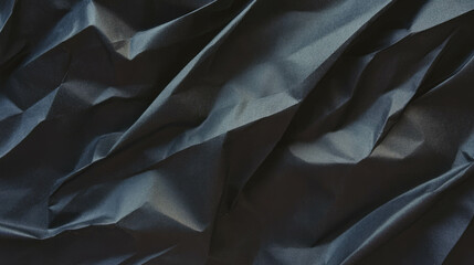Obraz premium Elegant black textured background with lightly rumpled paper
