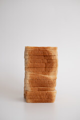 Sliced toast bread on white background.