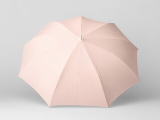Umbrella mockup A soft pink umbrella with a textured fabric, displayed from an overhead angle against a light background.