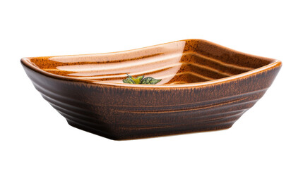 Brown bowl with a green leaf placed on a wooden surface in natural lighting isolated on transparent background..