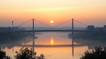 Serene Sunrise Over the Water with Bridge and Reflection