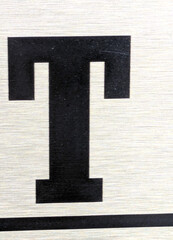 Written Wording in Distressed State Typography Found Ransom Letter T