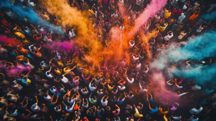 Aerial view of vibrant crowd celebrating Holi with colorful powder in air, creating festive and joyful atmosphere. scene is filled with people enjoying festival