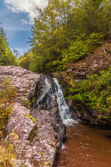 Draganov Vir Waterfall Falling down Red Rocks