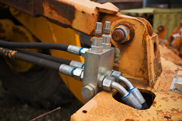 Old rusty industrial hydraulic valve.