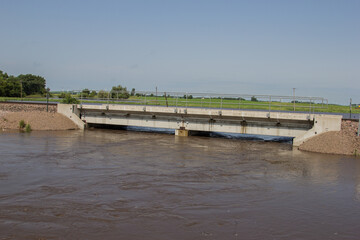 Fototapeta premium flood waters under a railroad bridge
