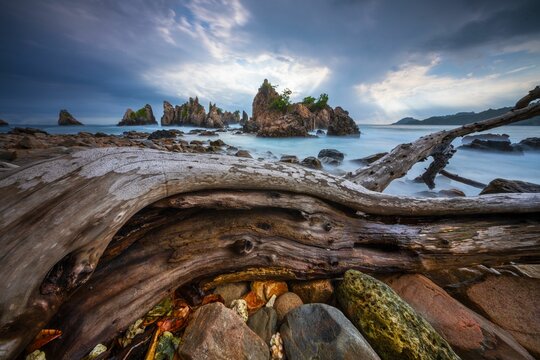 Landscape and seascape of rocky beach at Shark Tooth Beach Kelumbayan Lampung