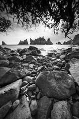 Landscape and seascape of rocky beach at Shark Tooth Beach Kelumbayan Lampung