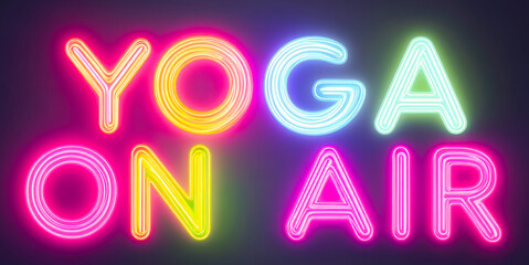 Colorful neon sign promoting yoga classes online with vibrant illumination and modern design at night