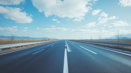 Fototapeta premium In the evening, the traffic on the highway passing through the mountainous area is like weaving