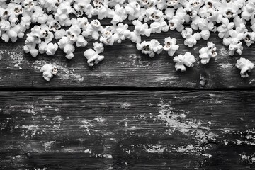 Fototapeta premium A realistic popcorn bucket filled to the top, showcasing the warm, buttery texture of this tasty treat, suitable for entertainment themes, comic book illustration style