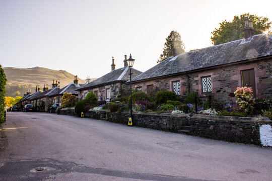Deserted street in the late afternoon in the quaint 18th century village of Luss next to Loch Lomond in Scotland