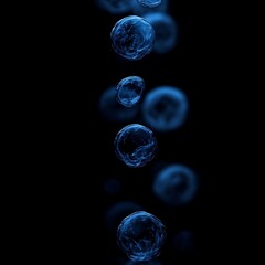 Blue bubbles falling, dark background, science
