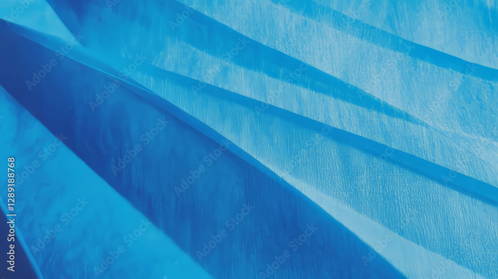 Poster abstract composition of fine ribbed blue paper texture with dynamic light and shadow play
