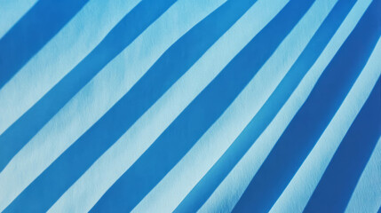 Obraz premium Abstract design of light and dark blue ribbed paper texture for creative projects