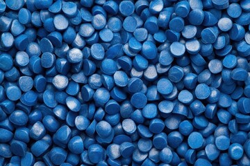 Closeup of Bright Blue Expanded Polystyrene Pellets: Abstract Facet Background for Plastic Bag Production