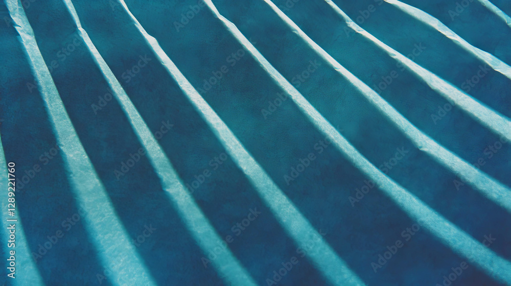 Aufkleber abstract texture of sharp ribbed blue paper with bright highlights for design