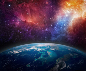 A lone star above the planet Earth. View from space to the starry sky and the Earth. Elements of this image furnished by NASA.