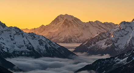 Golden Hour's Embrace on Snowy Peaks