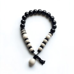 Obraz premium Stylish Black and Off White Beaded Bracelet Elegant Handmade Jewelry Accessory