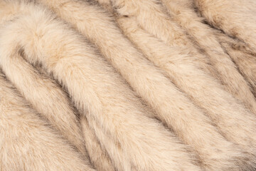 Texture of faux fur as a background, top view.