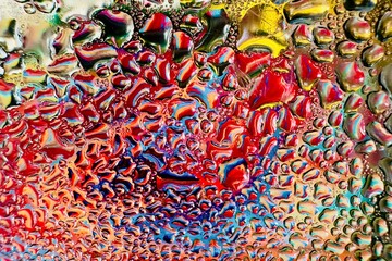 Close-up of water drops on metal surface in high resolution showing condensation of water droplets...