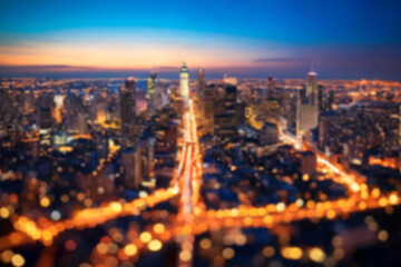 Naklejka premium The lights of the night city. Blurred background. Lanterns on the street. big city lights in the twilight evening with blurring. Colorful circles of light abstract. circular bokeh on blue horizon.