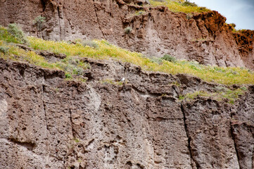 Geological rock formation. Tourism and travel destination, Greece. Geology. Volcanic rock nature. Rock formation with erosion. Landscape with rock formation. Nature formation. Basalt volcanic