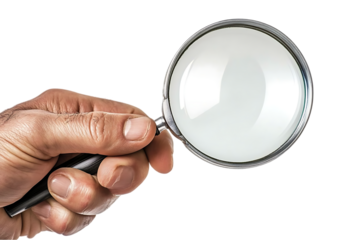 Close-up of hand holding magnifying glass.