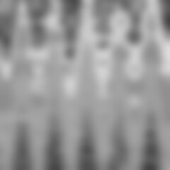 An neutral grayscale abstract wavy grunge texture background.