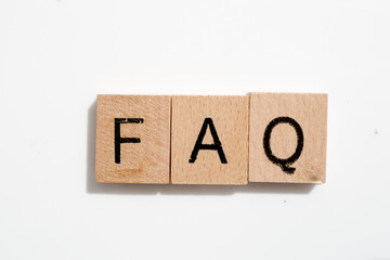 FAQ in wooden letters