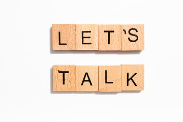 wood tiles with words let's talk