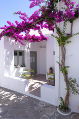 Fototapeta premium Picturesque main village of Kimolos island with beautiful cycladeic architecture built above of port Psathi, Cyclades, Greece