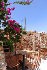 Fototapeta premium Picturesque main village of Kimolos island with beautiful cycladeic architecture built above of port Psathi, Cyclades, Greece