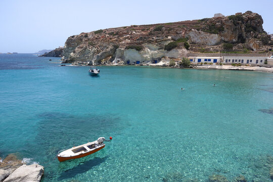 Picturesque seaside area and bay of Goupa - Karra with colourful boat houses a perfect place to swim, Kimolos island, Cyclades, Greece