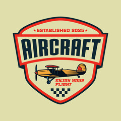vector design of t-shirt and airplane emblem logo © Hubbub