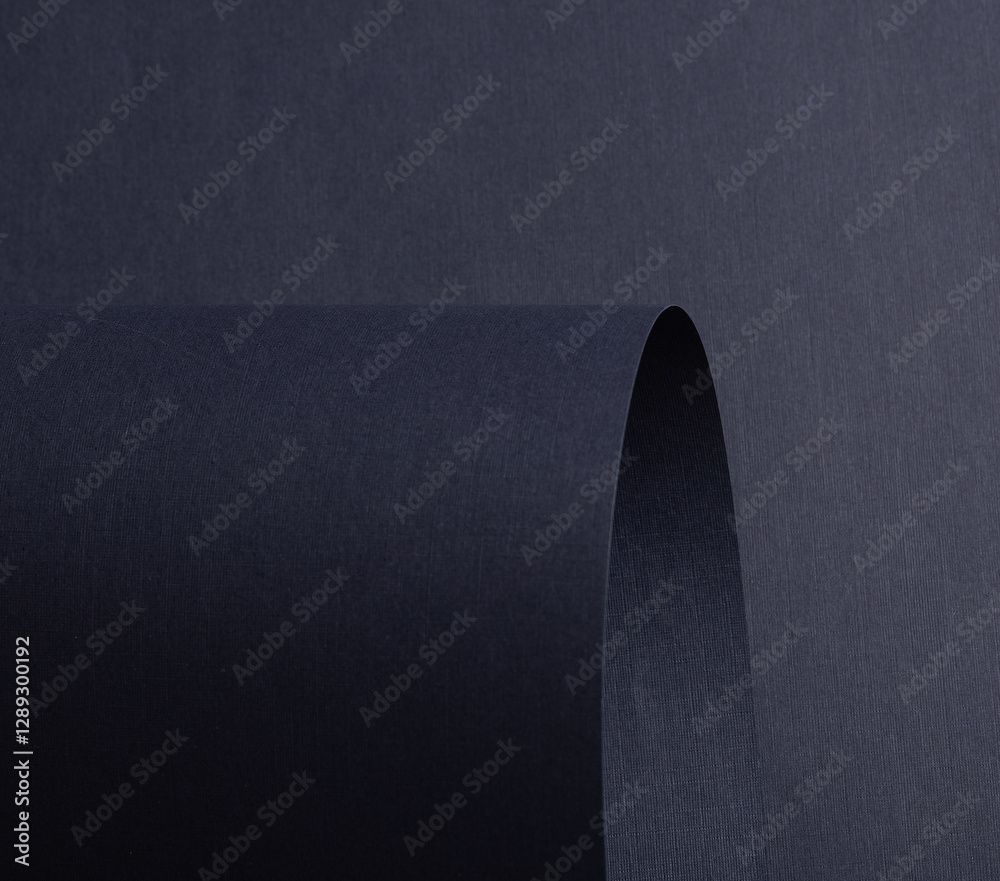Poster navy, blue, and midnight indigo paper with smooth texture. deep, rich folded curves create an elegan