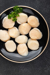 sea scallop raw seafood fresh tasty food dish delicious gourmet food background on the table rustic food top view copy space pescetarian diet