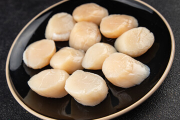 sea scallop raw seafood fresh tasty food dish delicious gourmet food background on the table rustic food top view copy space pescetarian diet
